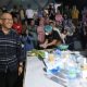 Pj. Wali Kota Kotamobagu, Asripan Nani saat ikut berpartisipasi dalam lomba masak nasi goreng, (Foto: Diskominfo KK).