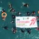 Kompak para Diver berhasil kibarkan spanduk di dasar laut desa Sondana. (Dok pribadi).